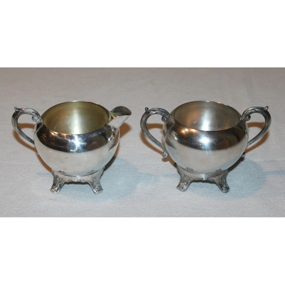 vintage F.B. Rogers Silver Co. silverplated creamer & sugar set with lid footed